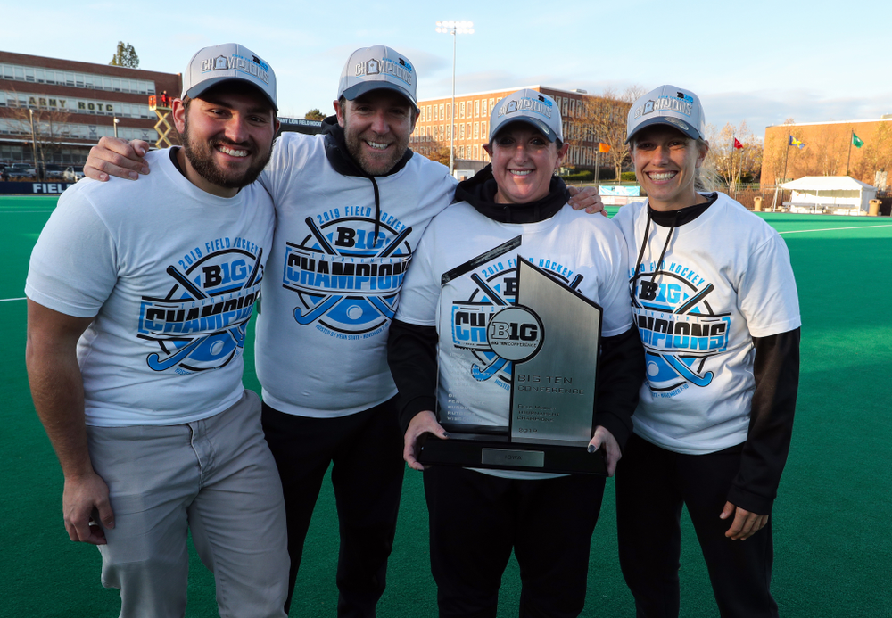 The Iowa Field Hockey coaches and manager Parker Dains following their game against Penn State in the 2019 Big Ten Field Hockey Tournament Championship Game Sunday, November 10, 2019 in State College. (Brian Ray/hawkeyesports.com)