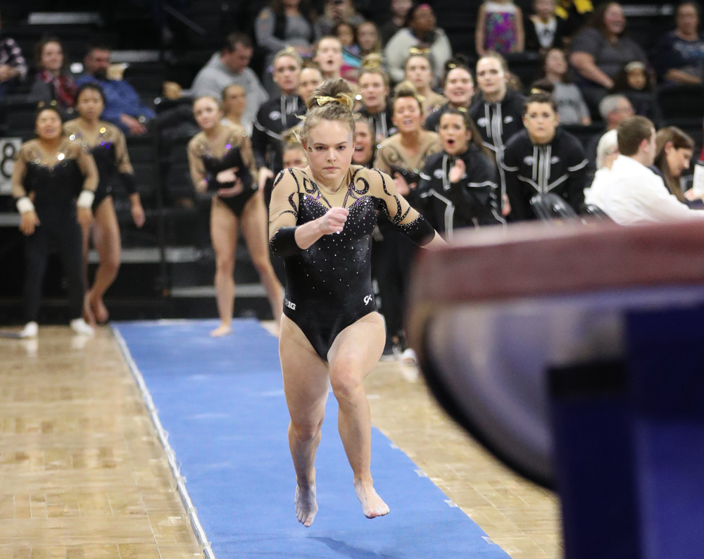 Iowa's Charlotte Sullivan competes on the vault during their meet against Southeast Missouri State Friday, January 11, 2019 at Carver-Hawkeye Arena. (Brian Ray/hawkeyesports.com)