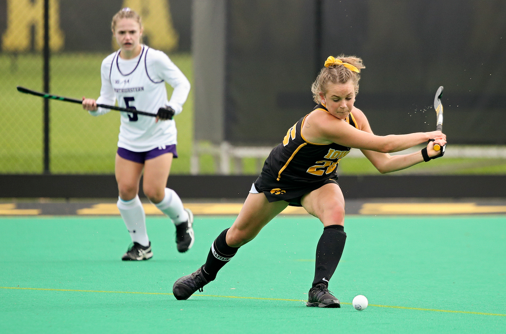 Iowa’s Maddy Murphy (26) lines up a shot during the first quarter of their game at Grant Field in Iowa City on Saturday, Oct 26, 2019. (Stephen Mally/hawkeyesports.com)