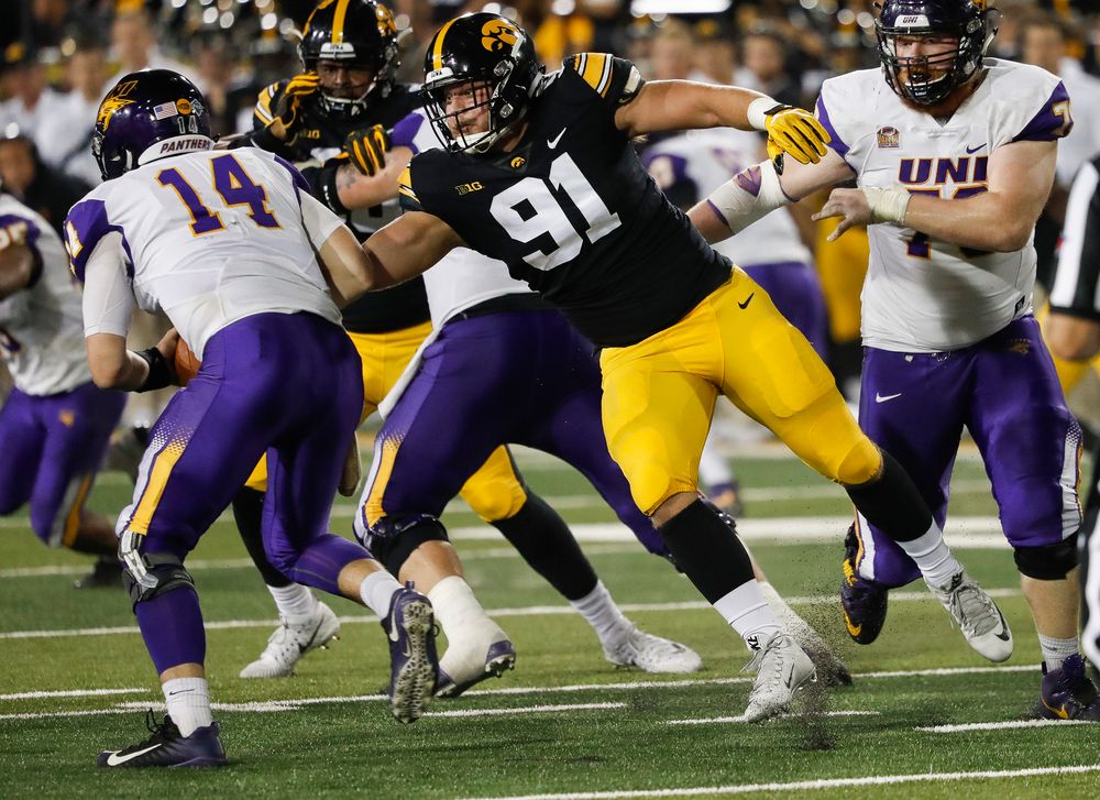 Iowa Hawkeyes defensive lineman Brady Reiff (91) rushes the quarterback during a game against Northern Iowa at Kinnick Stadium on September 15, 2018. (Tork Mason/hawkeyesports.com)