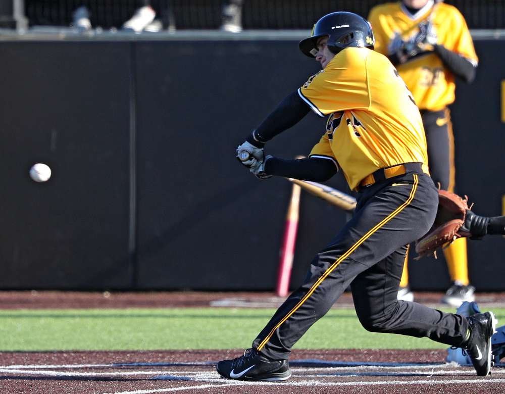 Iowa Hawkeyes designated hitter Austin Martin (34) drives a pitch for a hit during the fifth inning of their game at Duane Banks Field in Iowa City on Tuesday, Apr. 2, 2019. (Stephen Mally/hawkeyesports.com)