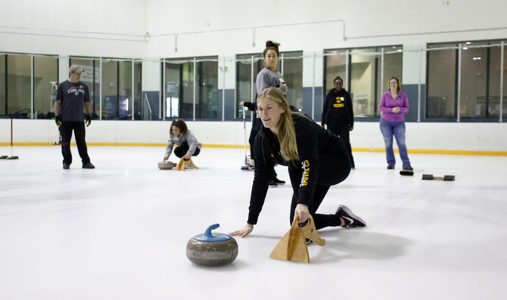 Members of the Iowa Softball team learn the sport of curling as part of a team building event Wednesday, January 10, 2018 at the Cedar Rapids Ice Arena. (Brian Ray/hawkeyesports.com)