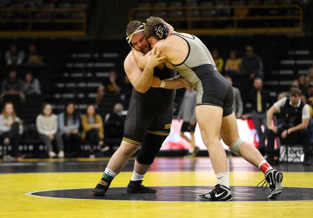 Iowa's Aaron Costello wrestles Purdue's Jacob Aven at heavyweight Saturday, November 24, 2018 at Carver-Hawkeye Arena. (Brian Ray/hawkeyesports.com)