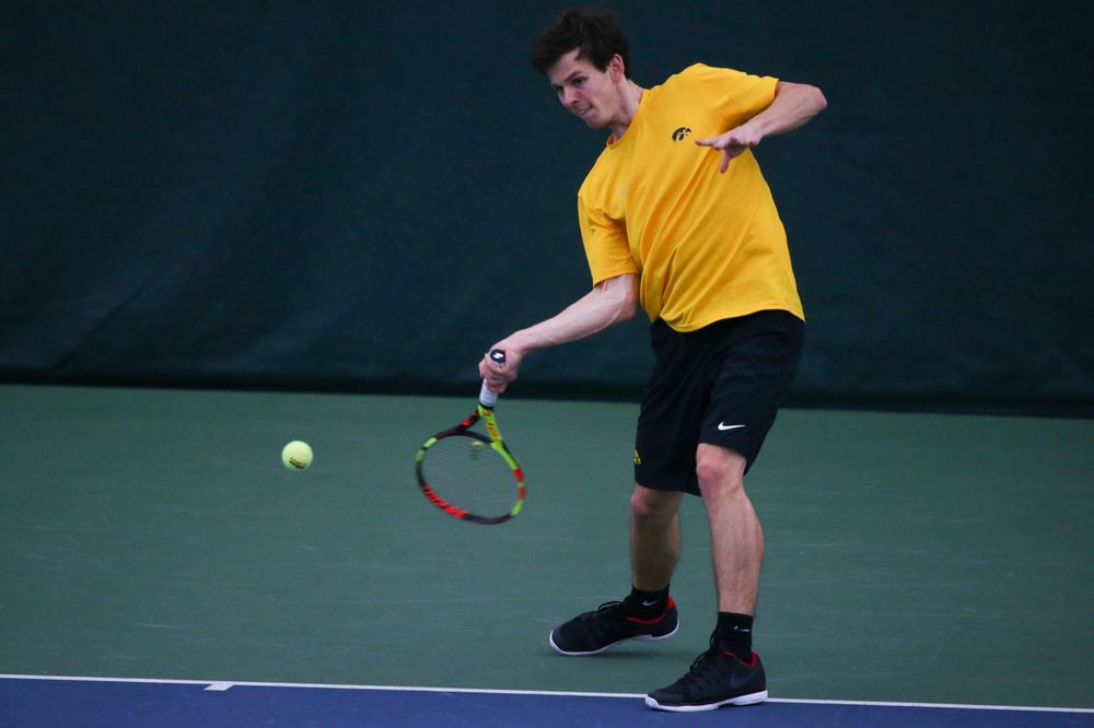 Iowa's Joe Tyler at a tennis match vs Drake Friday, March 8, 2019 at the Hawkeye Tennis and Recreation Complex. (Lily Smith/hawkeyesports.com)