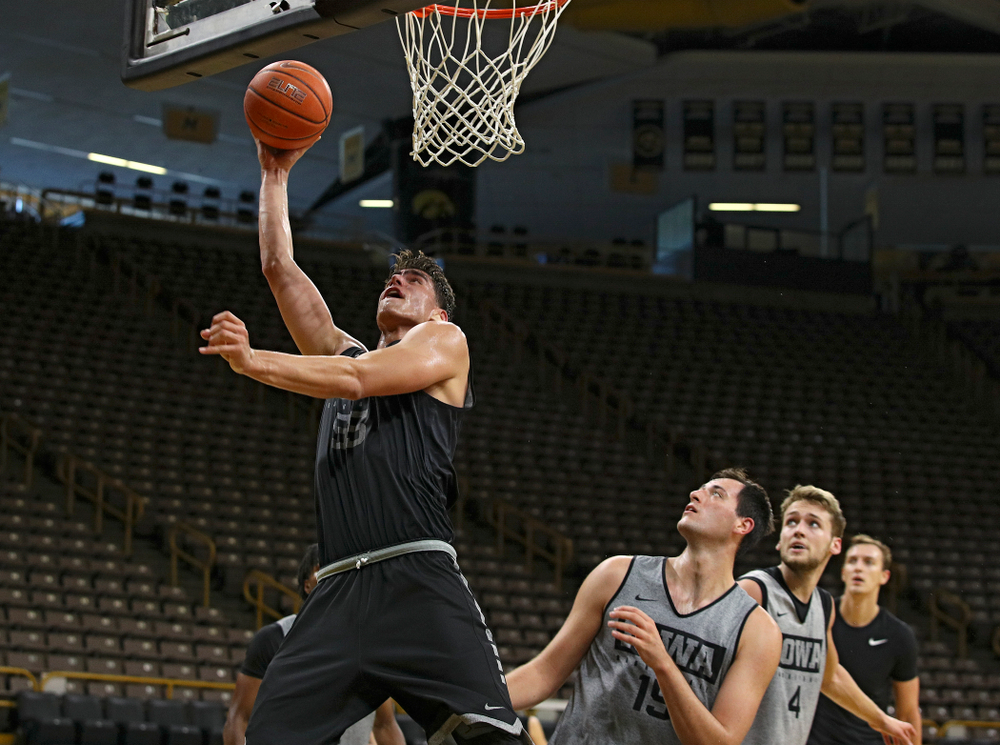 Iowa Hawkeyes center Luka Garza (55) puts up a shot during practice at Carver-Hawkeye Arena in Iowa City on Monday, Sep 30, 2019. (Stephen Mally/hawkeyesports.com)