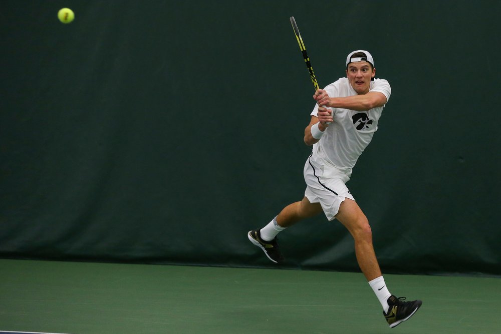 Iowa’s Joe Tyler hits a backhand during the Iowa men’s tennis match vs Western Michigan on Saturday, January 18, 2020 at the Hawkeye Tennis and Recreation Complex. (Lily Smith/hawkeyesports.com)