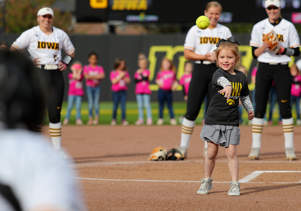 A young fan throws out the first pitch before the game against Ohio State at Pearl Field in Iowa City on Friday, May. 3, 2019. (Stephen Mally/hawkeyesports.com)