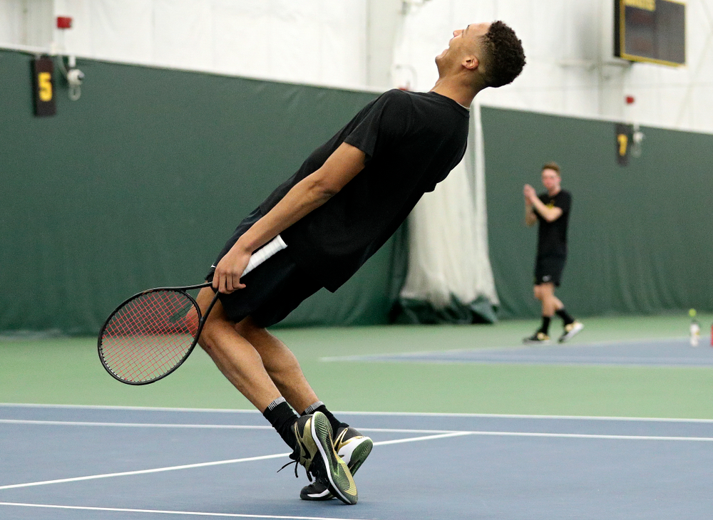 Iowa’s Oliver Okonkwo celebrates a point during his doubles match at the Hawkeye Tennis and Recreation Complex in Iowa City on Friday, February 14, 2020. (Stephen Mally/hawkeyesports.com)