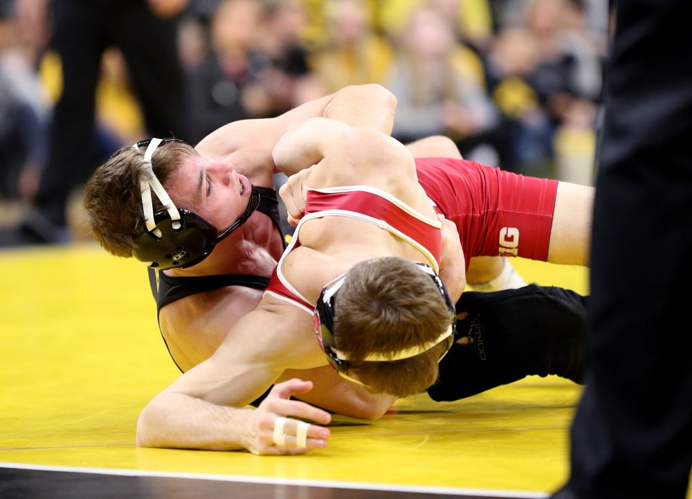 IowaÕs Spencer Lee wrestles WisconsinÕs Michael Cullen at 125 pounds Sunday, December 1, 2019 at Carver-Hawkeye Arena. Lee won the match with a 16-0 technical fall. (Brian Ray/hawkeyesports.com)
