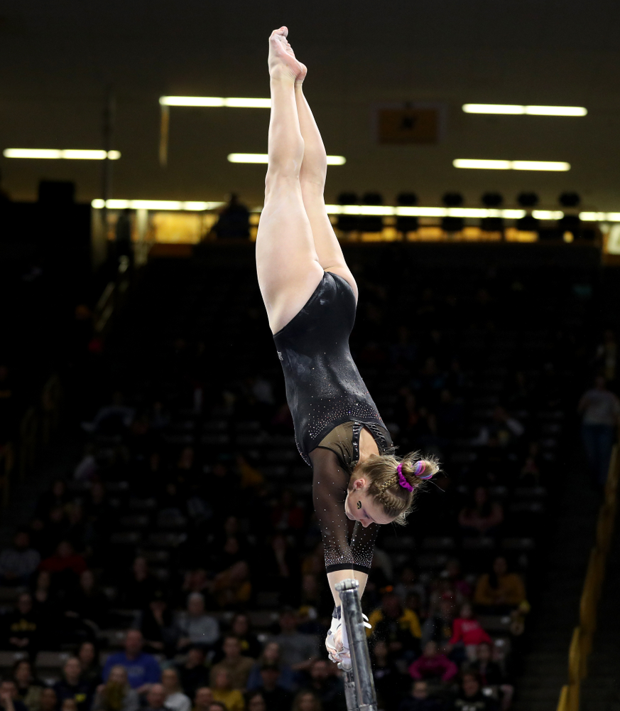 Iowa’s Allyson Steffensmeier competes on the bars against Michigan Friday, February 14, 2020 at Carver-Hawkeye Arena. (Brian Ray/hawkeyesports.com)