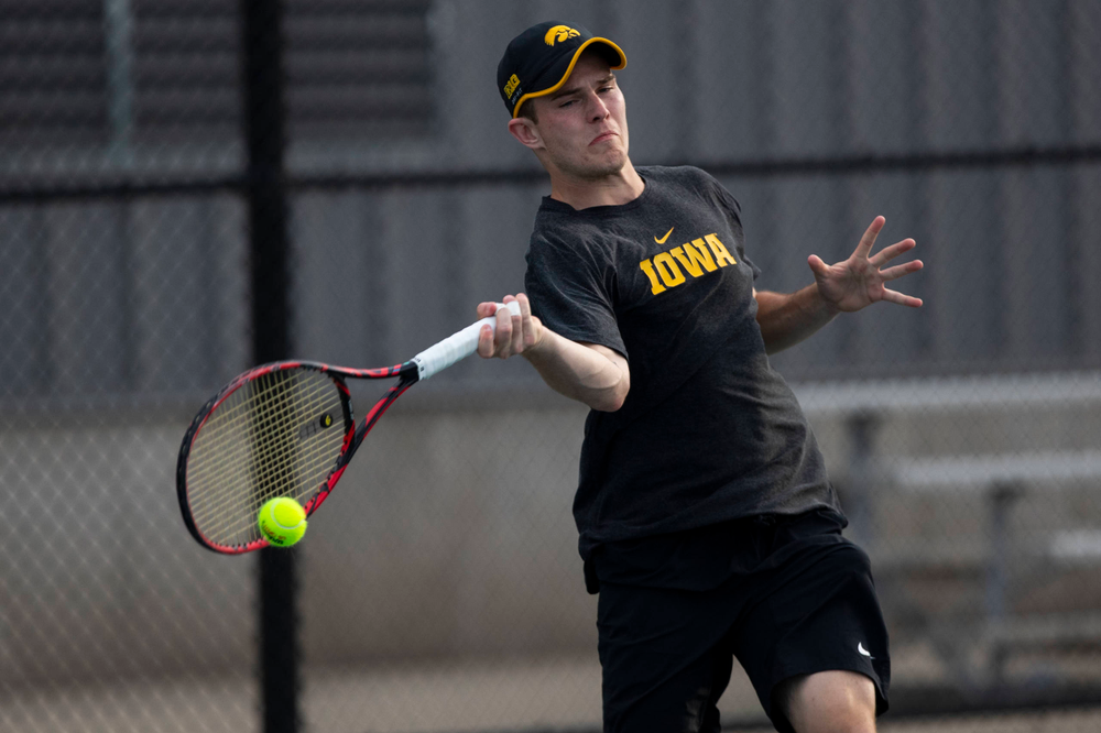 IowaÕs Jonas Larsen at tennis vs Illinois State on Sunday, April 21, 2019 at the Hawkeye Tennis and Recreation Complex. (Lily Smith/hawkeyesports.com)