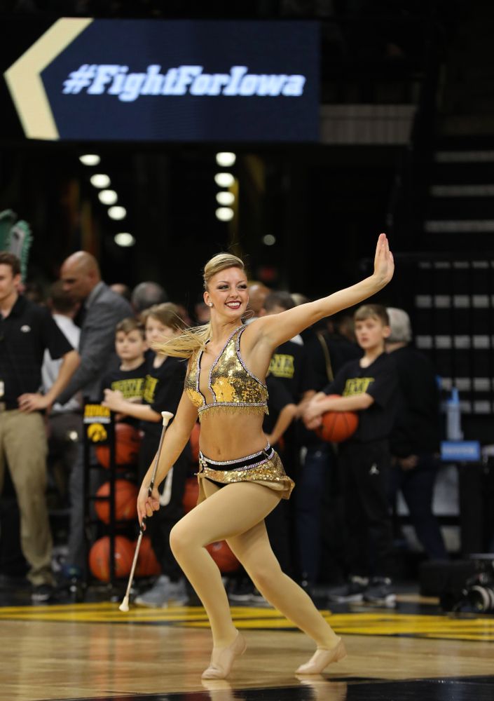 Hawkeye Marching Band Golden Girl ?Kylene Spanbauer performs at halftime of the Iowa Hawkeyes game against the Michigan Wolverines Friday, February 1, 2019 at Carver-Hawkeye Arena. (Brian Ray/hawkeyesports.com)