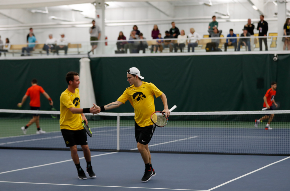 Jonas Larsen and Kareem Allaf play a doubles match against the Illinois Fighting Illini Saturday, March 31, 2018 at Hawkeye Tennis and Recreation Center. (Brian Ray/hawkeyesports.com)