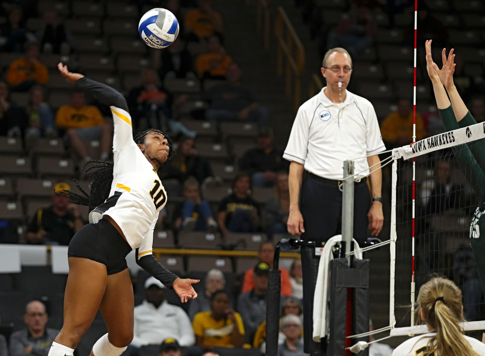 Iowa’s Griere Hughes (10) lines up a kill during the third set of their volleyball match at Carver-Hawkeye Arena in Iowa City on Sunday, Oct 13, 2019. (Stephen Mally/hawkeyesports.com)