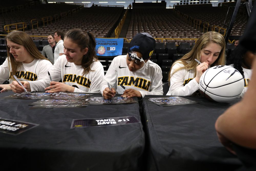 Iowa Hawkeyes guard Tania Davis (11) during a celebration of their Big Ten Women's Basketball Tournament championship Monday, March 18, 2019 at Carver-Hawkeye Arena. (Brian Ray/hawkeyesports.com)