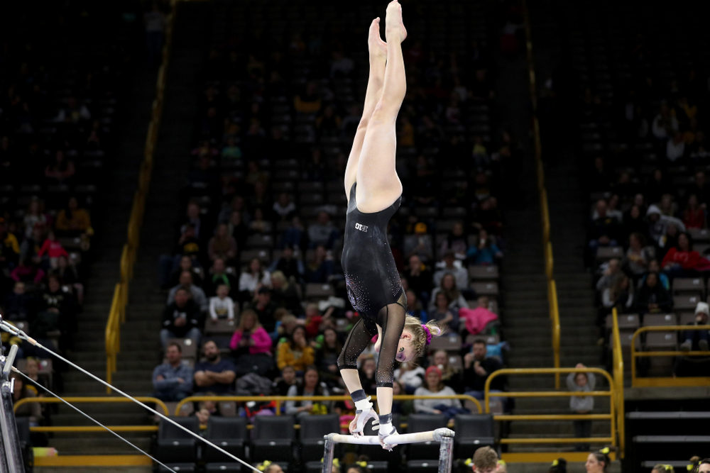 Iowa’s Allyson Steffensmeier competes on the bars against Michigan Friday, February 14, 2020 at Carver-Hawkeye Arena. (Brian Ray/hawkeyesports.com)
