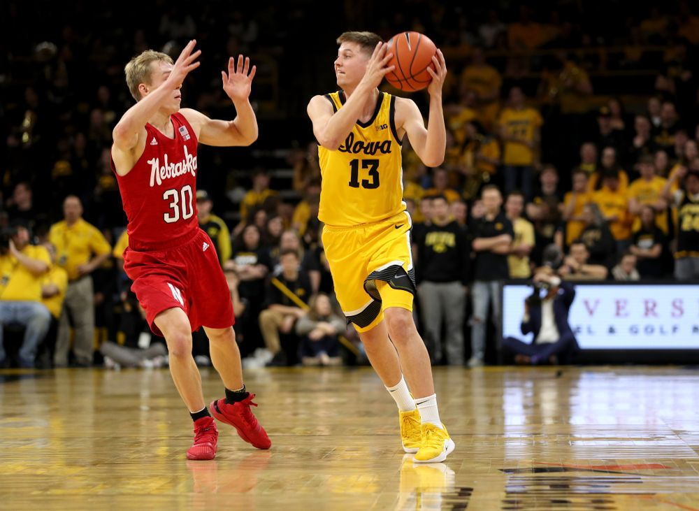 Iowa Hawkeyes guard Austin Ash (13) against the Nebraska Cornhuskers Saturday, February 8, 2020 at Carver-Hawkeye Arena. (Brian Ray/hawkeyesports.com)