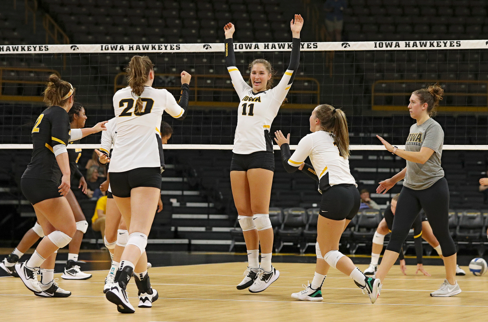 Iowa’s Blythe Rients (11) celebrates with teammates during the second set of the Black and Gold scrimmage at Carver-Hawkeye Arena in Iowa City on Saturday, Aug 24, 2019. (Stephen Mally/hawkeyesports.com)