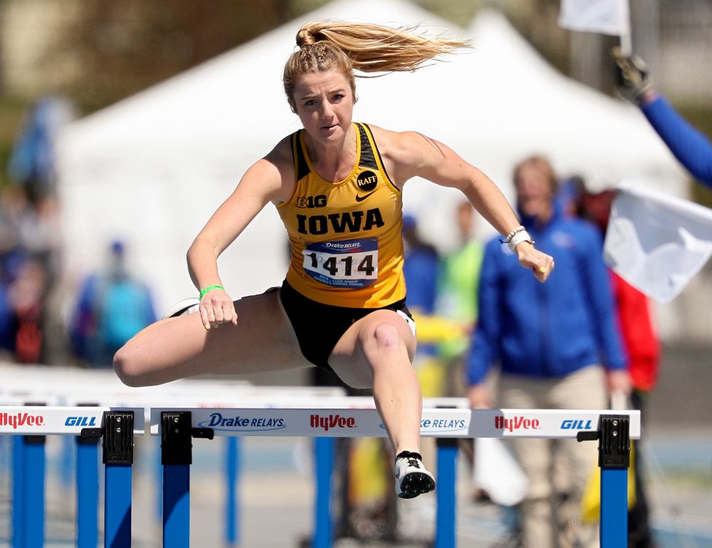 Iowa's Sydney Winger runs the women's 100 meter hurdles event during the second day of the Drake Relays at Drake Stadium in Des Moines on Friday, Apr. 26, 2019. (Stephen Mally/hawkeyesports.com)