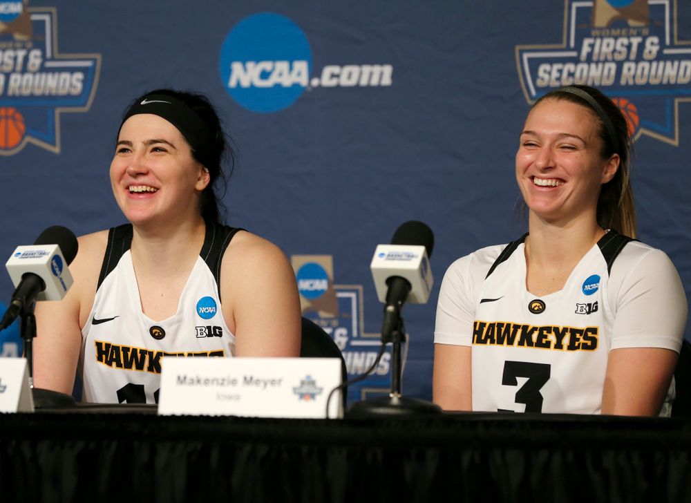 Iowa Hawkeyes forward Megan Gustafson (10) and guard Makenzie Meyer (3) share a laugh as they talk during their press availability after winning their game in the first round of the 2019 NCAA Women's Basketball Tournament at Carver Hawkeye Arena in Iowa City on Friday, Mar. 22, 2019. (Stephen Mally for hawkeyesports.com)