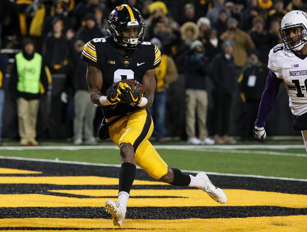Iowa Hawkeyes wide receiver Ihmir Smith-Marsette (6) makes a touchdown reception during a game against Northwestern at Kinnick Stadium on November 10, 2018. (Tork Mason/hawkeyesports.com)