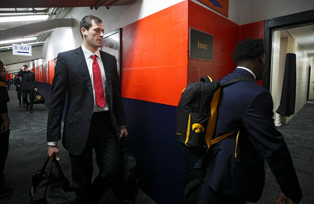 Iowa Hawkeyes forward Ryan Kriener (15) walks to the locker room as the team arrives before their ACC/Big Ten Challenge game at the Carrier Dome in Syracuse, N.Y. on Tuesday, Dec 3, 2019. (Stephen Mally/hawkeyesports.com)