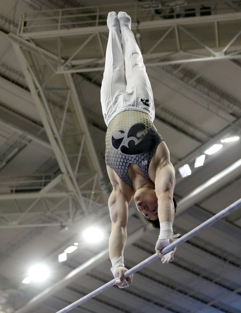 Iowa’s Bennet Huang competes on the high bar against UIC and Minnesota Saturday, February 1, 2020 at Carver-Hawkeye Arena. (Brian Ray/hawkeyesports.com)
