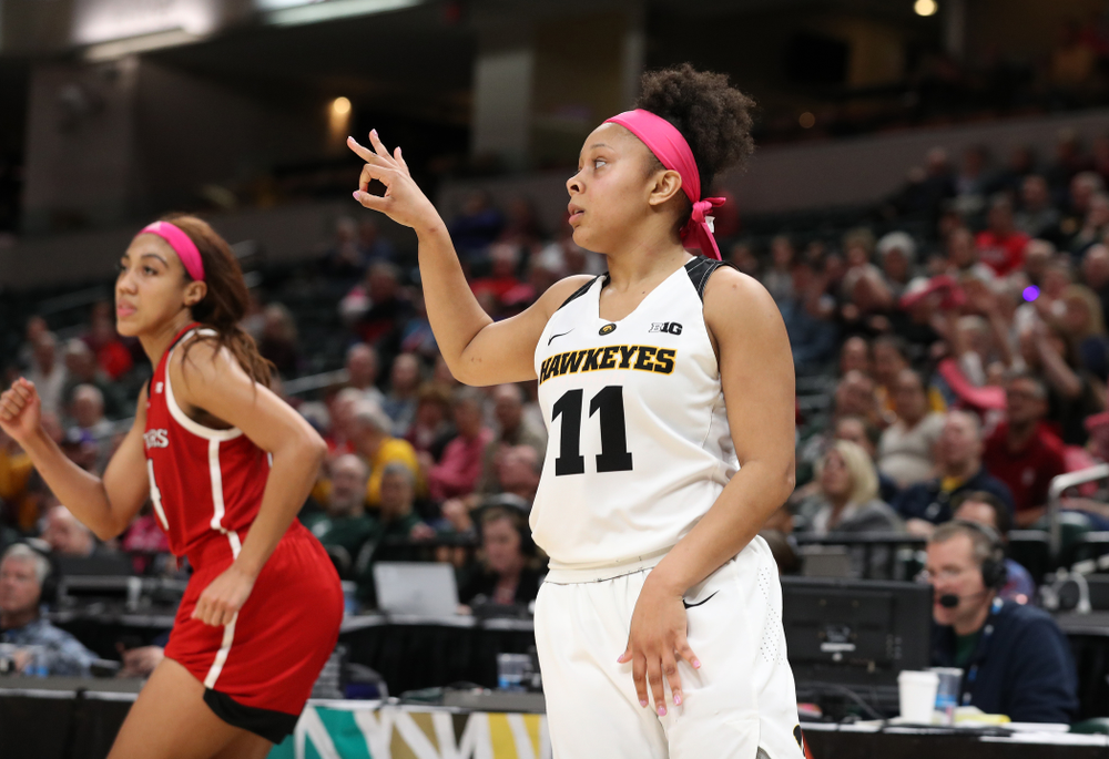 Iowa Hawkeyes guard Makenzie Meyer (3) celebrates a three point basket against the Rutgers Scarlet Knights in the semi-finals of the Big Ten Tournament Saturday, March 9, 2019 at Bankers Life Fieldhouse in Indianapolis, Ind. (Brian Ray/hawkeyesports.com)