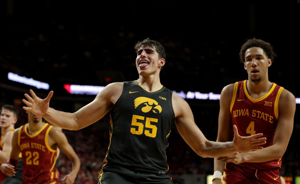 Iowa Hawkeyes forward Luka Garza (55) celebrates after dunking the ball against the Iowa State Cyclones Thursday, December 12, 2019 at Hilton Coliseum in Ames, Iowa(Brian Ray/hawkeyesports.com)