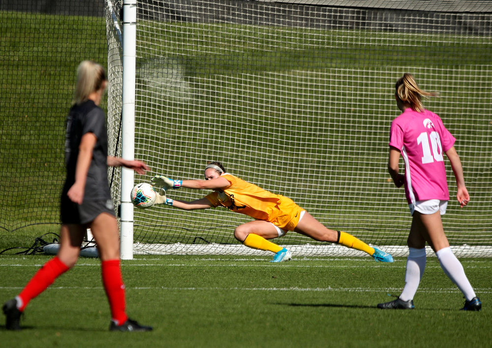 Iowa goalkeeper Claire Graves (1) grabs a save during the first half of their match at the Iowa Soccer Complex in Iowa City on Sunday, Oct 27, 2019. (Stephen Mally/hawkeyesports.com)