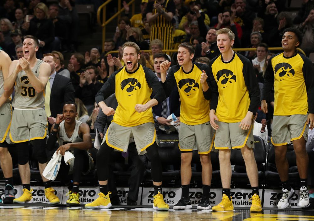 Iowa Hawkeyes forward Riley Till (20), guard Austin Ash (13), and forward Michael Baer (0) against the Nebraska Cornhuskers Sunday, January 6, 2019 at Carver-Hawkeye Arena. (Brian Ray/hawkeyesports.com)