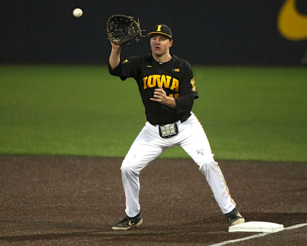 Iowa first baseman Peyton Williams (45) looks in a throw during the seventh inning of their game at Duane Banks Field in Iowa City on Tuesday, March 3, 2020. (Stephen Mally/hawkeyesports.com)