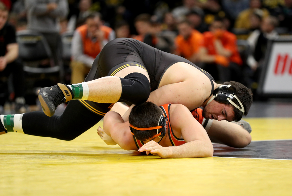 Iowa’s Tony Cassioppi wrestles Oklahoma State’s Auston Harris at heavyweight Sunday, February 23, 2020 at Carver-Hawkeye Arena. Cassioppi won the match 11-1. (Brian Ray/hawkeyesports.com)