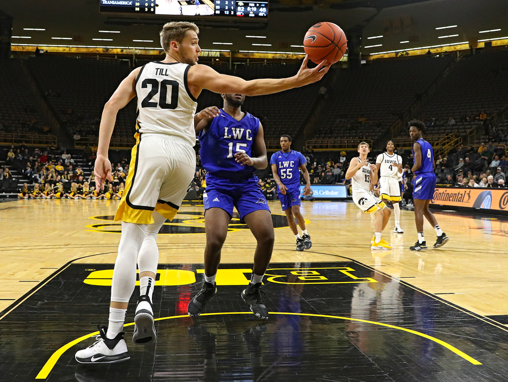 Iowa Hawkeyes forward Riley Till (20) grabs a pass during the second half of their exhibition game against Lindsey Wilson College at Carver-Hawkeye Arena in Iowa City on Monday, Nov 4, 2019. (Stephen Mally/hawkeyesports.com)