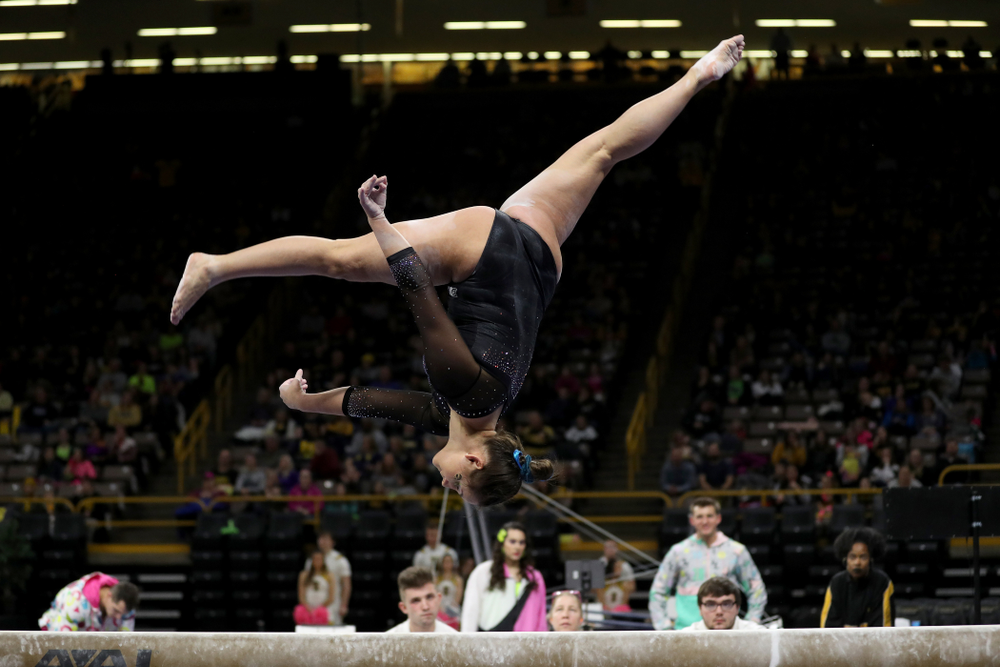 Iowa’s Dani Castillo competes on the beam against Michigan Friday, February 14, 2020 at Carver-Hawkeye Arena. (Brian Ray/hawkeyesports.com)
