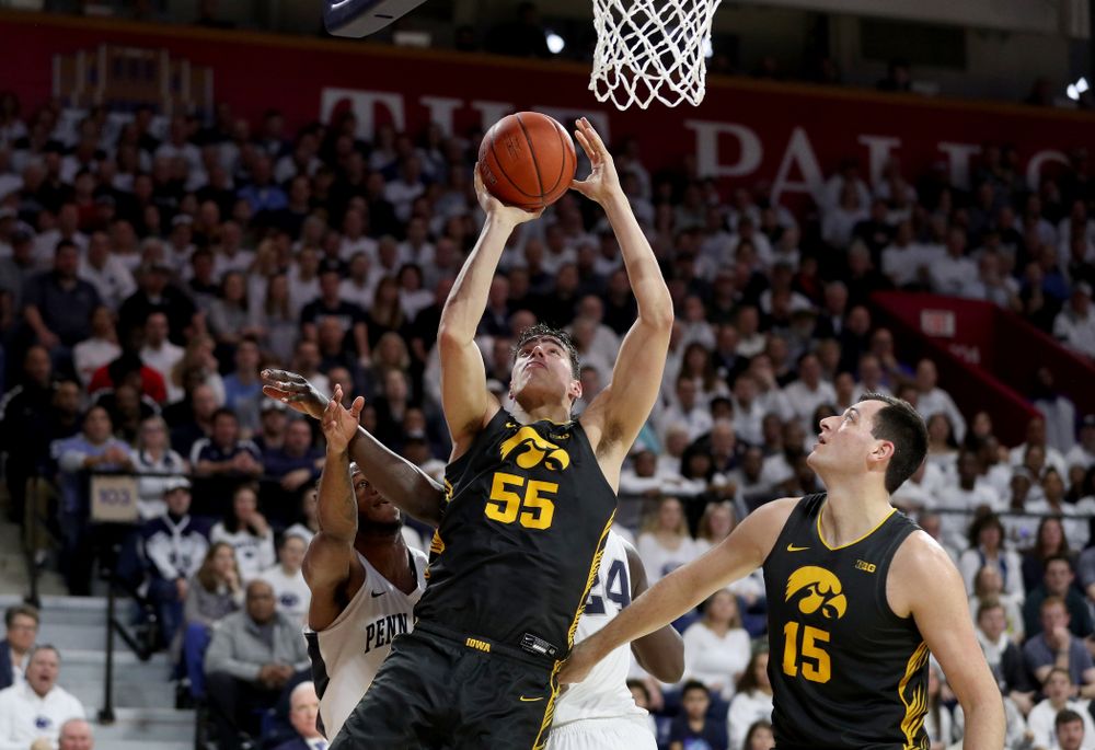 Iowa Hawkeyes forward Luka Garza (55) goes to the hoop against Penn State Friday, January 3, 2020 at the Palestra in Philadelphia. (Brian Ray/hawkeyesports.com)