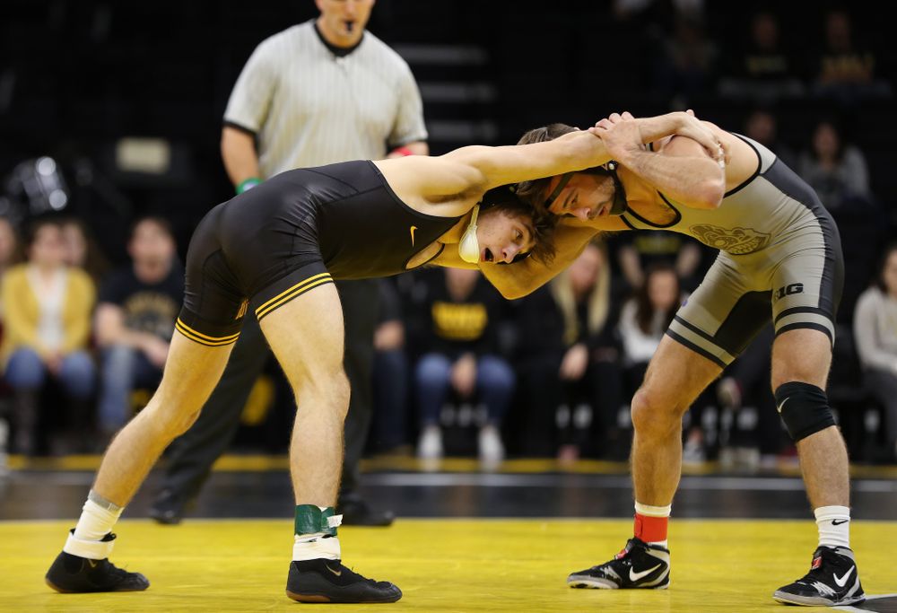 Iowa's Austin DeSanto wrestles Purdue's Ben Thornton at 133 pounds Saturday, November 24, 2018 at Carver-Hawkeye Arena. (Brian Ray/hawkeyesports.com)
