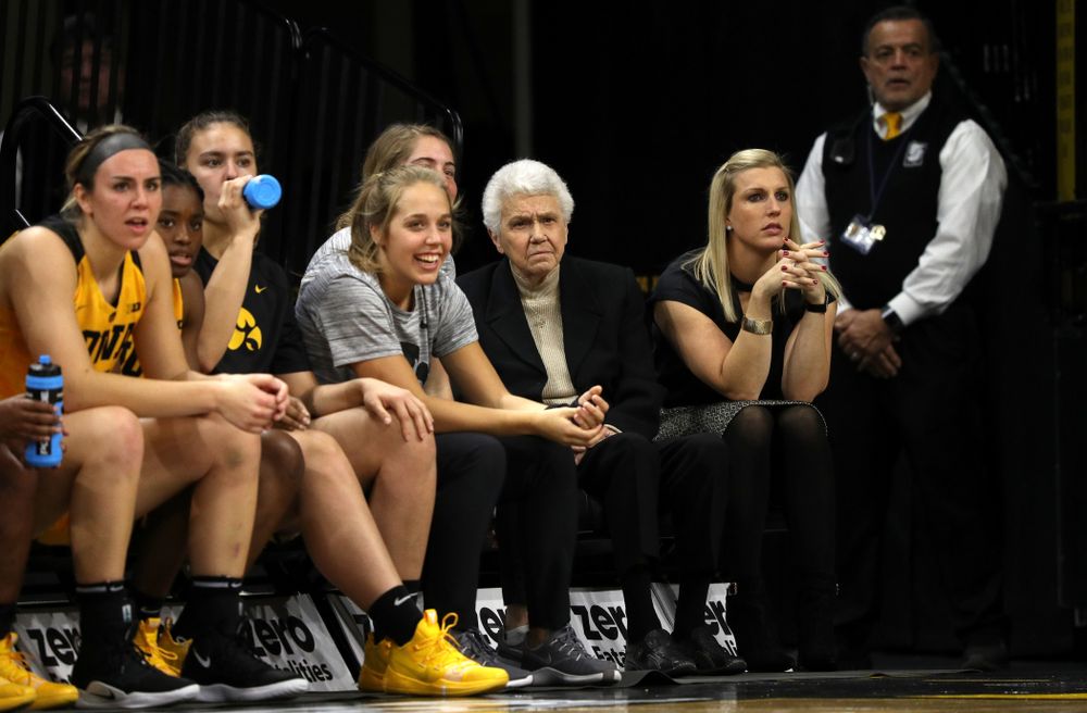 Dr. Christine Grant sits on the Iowa Hawkeyes bench during their game against the Robert Morris Colonials Sunday, December 2, 2018 at Carver-Hawkeye Arena. (Brian Ray/hawkeyesports.com)