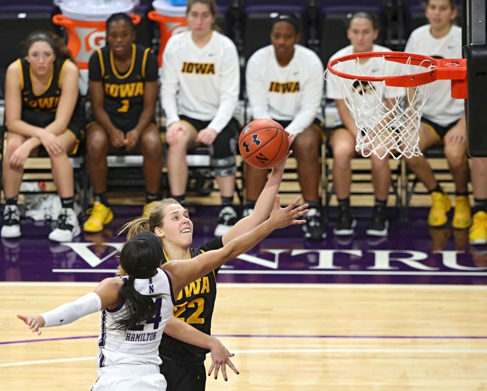 Iowa Hawkeyes guard Kathleen Doyle (22) makes a basket during the fourth quarter of their game at Welsh-Ryan Arena in Evanston, Ill. on Sunday, January 5, 2020. (Stephen Mally/hawkeyesports.com)