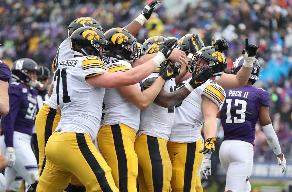 The Iowa Hawkeyes celebrate after scoring against the Northwestern Wildcats Saturday, September 28, 2019 at Kinnick Stadium. (Max Allen/hawkeyesports.com)