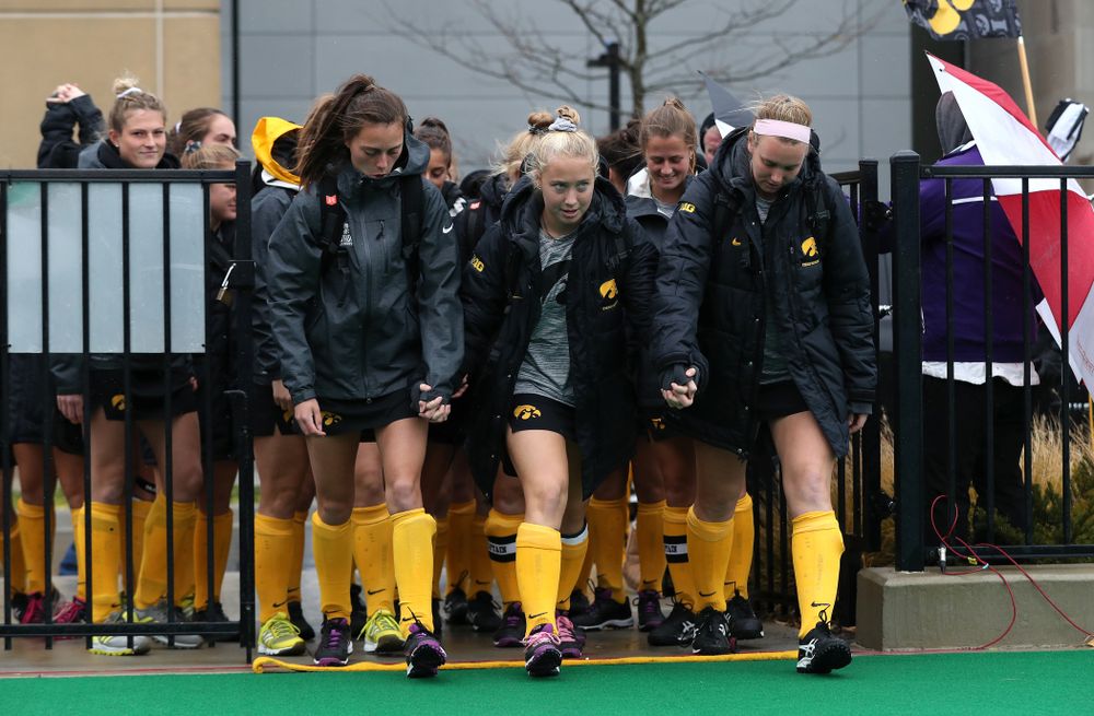 The Iowa Hawkeyes seniors cross the line before their game against Maryland in the championship game of the Big Ten Tournament Sunday, November 4, 2018 at Lakeside Field in Evanston, Ill. (Brian Ray/hawkeyesports.com)
