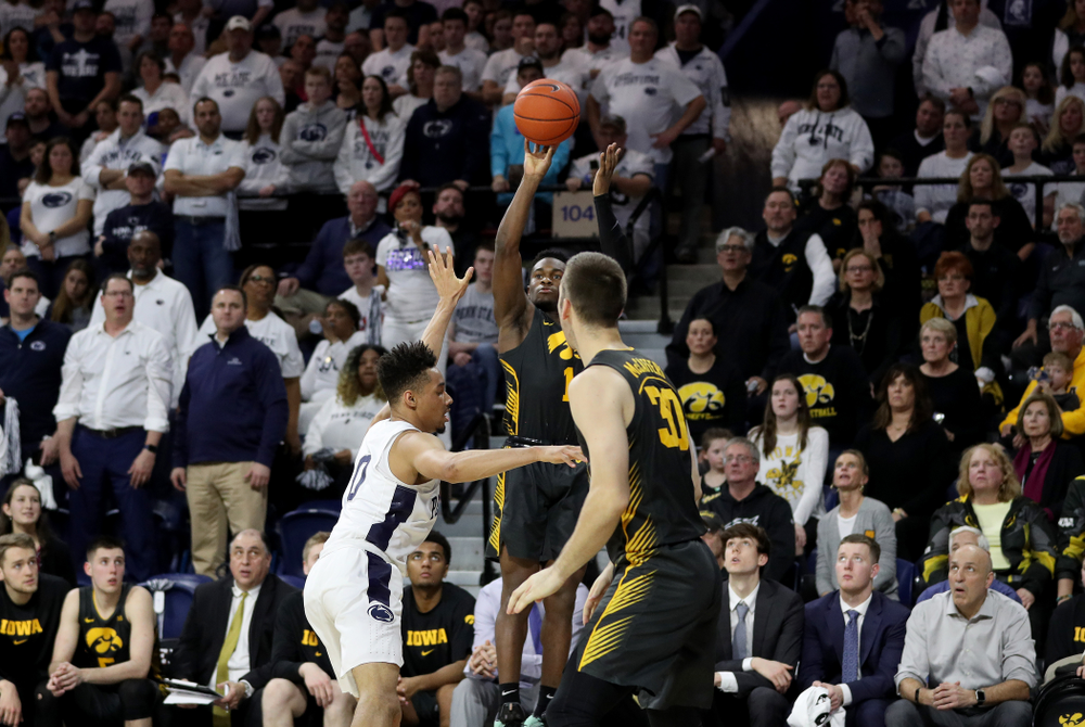 Iowa Hawkeyes guard Joe Toussaint (1) knocks down a three point basket against Penn State Saturday, January 4, 2020 at the Palestra in Philadelphia. (Brian Ray/hawkeyesports.com)