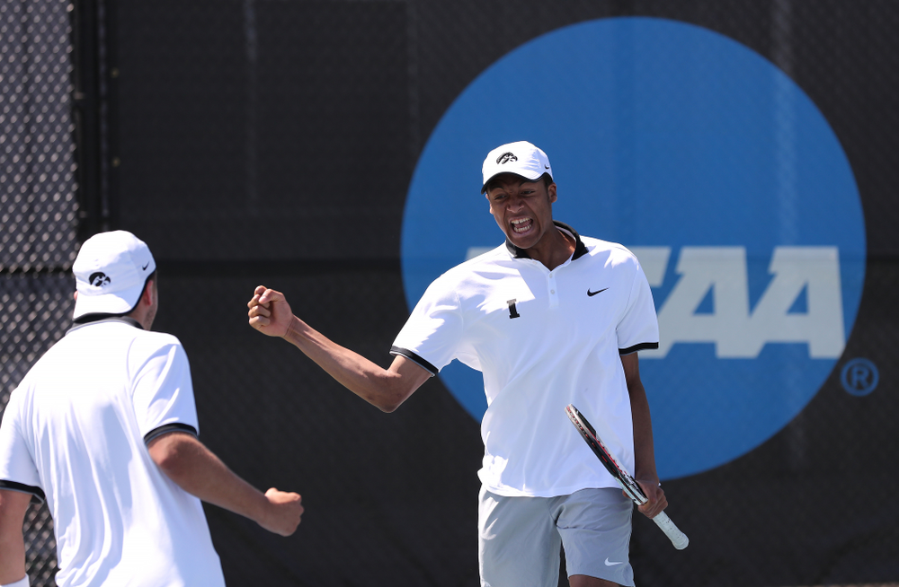 IowaÕs Oliver Okonkwo and Will Davies play a doubles match against the Michigan Wolverines Sunday, April 21, 2019 at the Hawkeye Tennis and Recreation Complex. (Brian Ray/hawkeyesports.com)