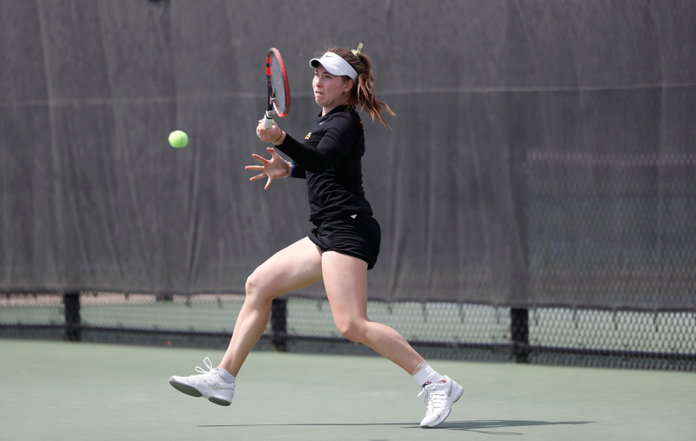 Iowa's Anastasia Reimchen against the Wisconsin Badgers Sunday, April 22, 2018 at the Hawkeye Tennis and Recreation Center. (Brian Ray/hawkeyesports.com)