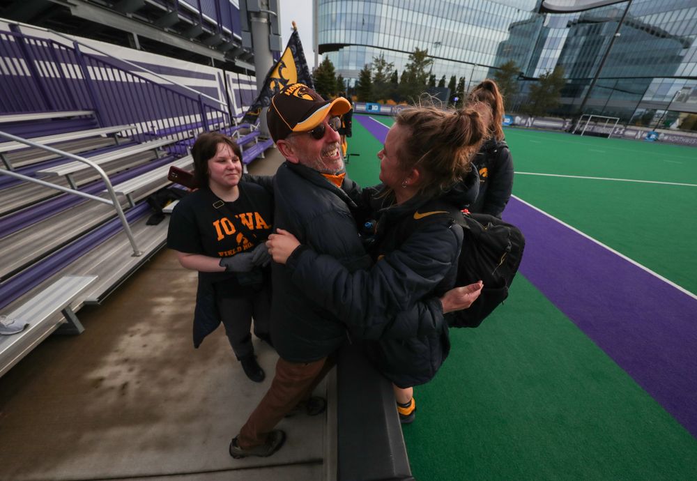 Iowa Hawkeyes Maddy Murphy (26) hugs her family after their 2-1 victory over the Michigan Wolverines in the semi-finals of the Big Ten Tournament Friday, November 2, 2018 at Lakeside Field on the campus of Northwestern University in Evanston, Ill. (Brian Ray/hawkeyesports.com)
