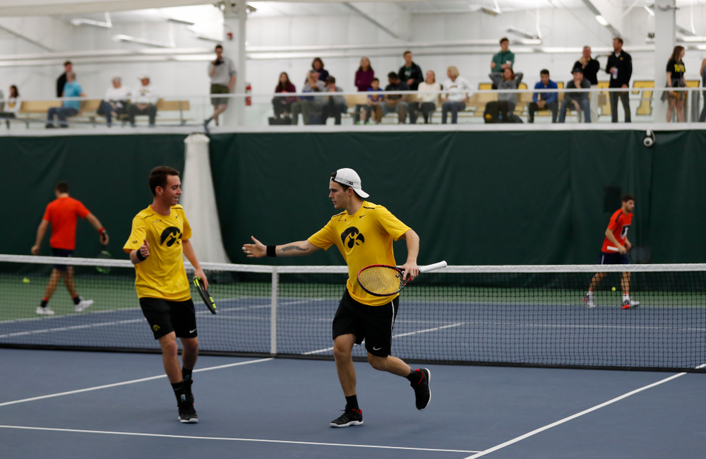 Jonas Larsen and Kareem Allaf play a doubles match against the Illinois Fighting Illini Saturday, March 31, 2018 at Hawkeye Tennis and Recreation Center. (Brian Ray/hawkeyesports.com)