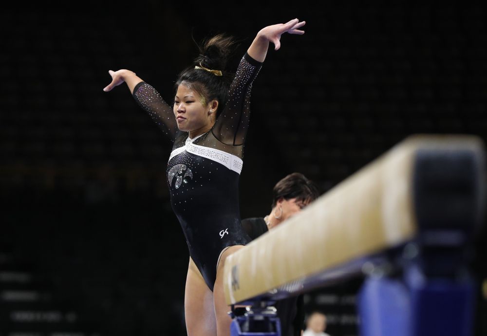 Iowa's Misty-Jade Carlson competes on the beam against the Rutgers Scarlet Knights Saturday, January 26, 2019 at Carver-Hawkeye Arena. (Brian Ray/hawkeyesports.com)