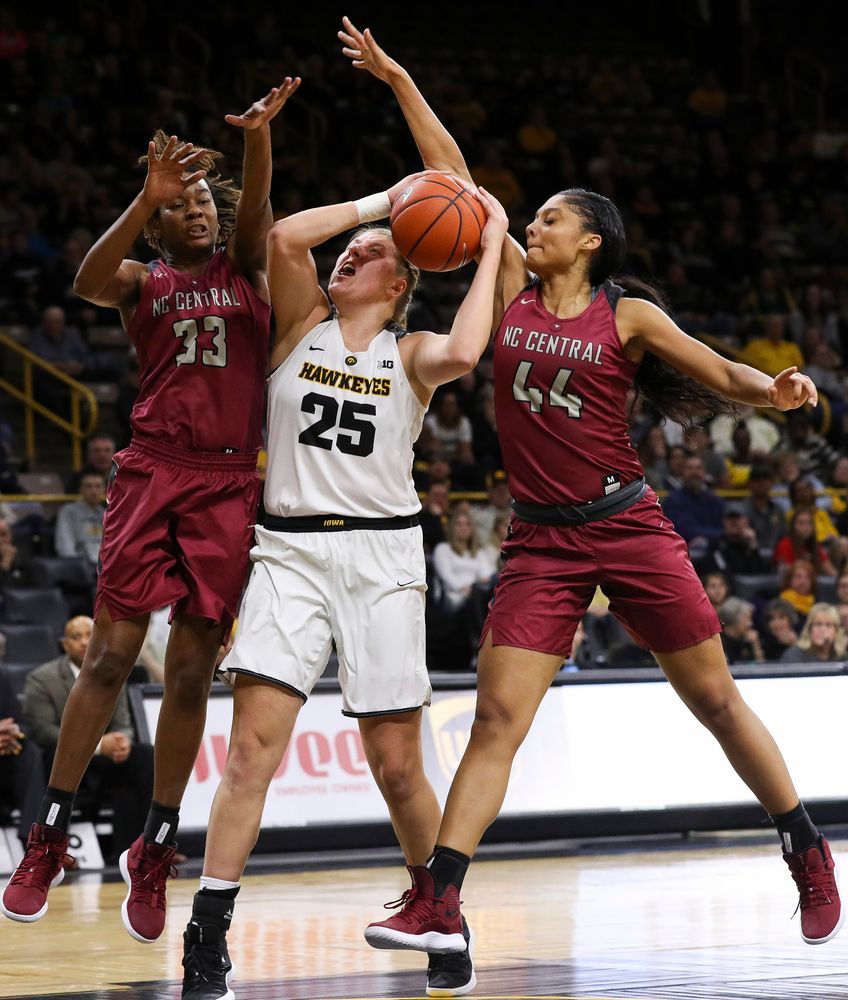 Iowa Hawkeyes forward Monika Czinano (25) is fouled in the act of shooting during a game against North Carolina Central at Carver-Hawkeye Arena on November 17, 2018. (Tork Mason/hawkeyesports.com)
