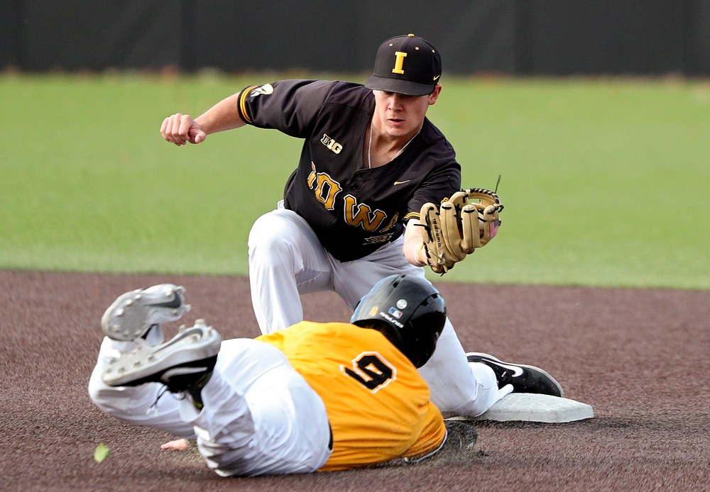 Iowa’s Sam Link (3) tags out outfielder Ben Norman (9) as he tries to steal second base during the second inning of the first game of the Black and Gold Fall World Series at Duane Banks Field in Iowa City on Tuesday, Oct 15, 2019. (Stephen Mally/hawkeyesports.com)