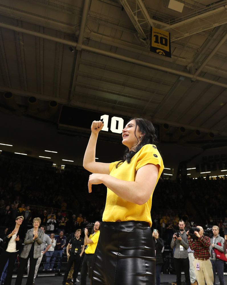 Megan Gustafson smiles after her number was raised into the rafters during a jersey retirement ceremony Sunday, January 26, 2020 at Carver-Hawkeye Arena. (Brian Ray/hawkeyesports.com)